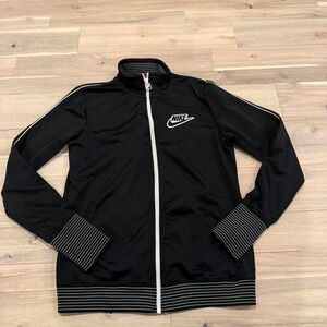VINTAGE Nike black track jacket with white stripes and embroidered logo. Size M